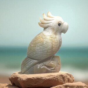 Natural quartz crystal mineral Amazon stone hand-carved parrot reiki collection.